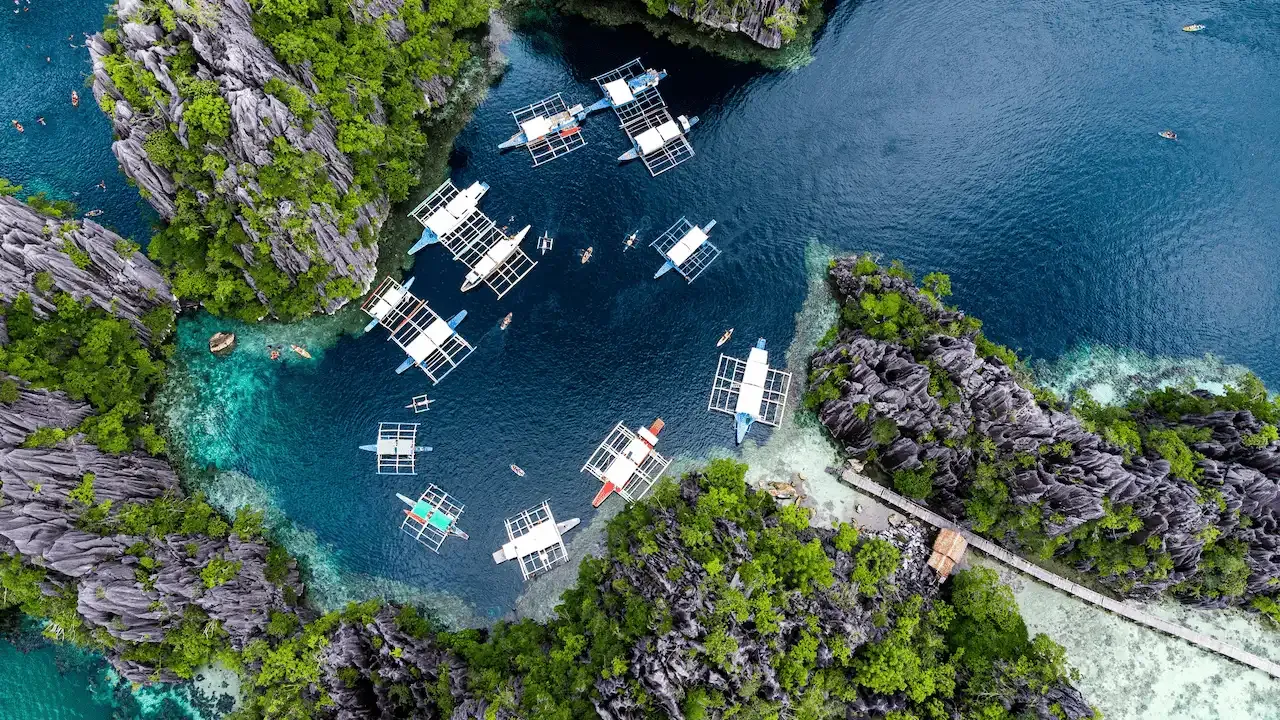 Lagoon surrounded by rock formations in El Nido, Palawan, Philippines.