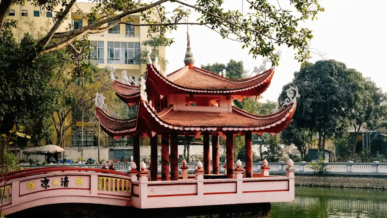 Beautiful traditional Vietnamese pagoda by a tranquil pond