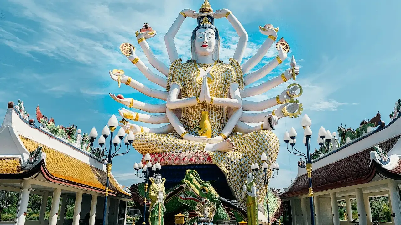 Gold and blue hindu deity statue