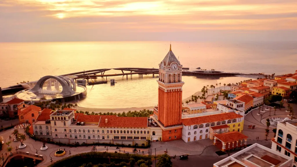 An aerial view of a city with a clock tower.