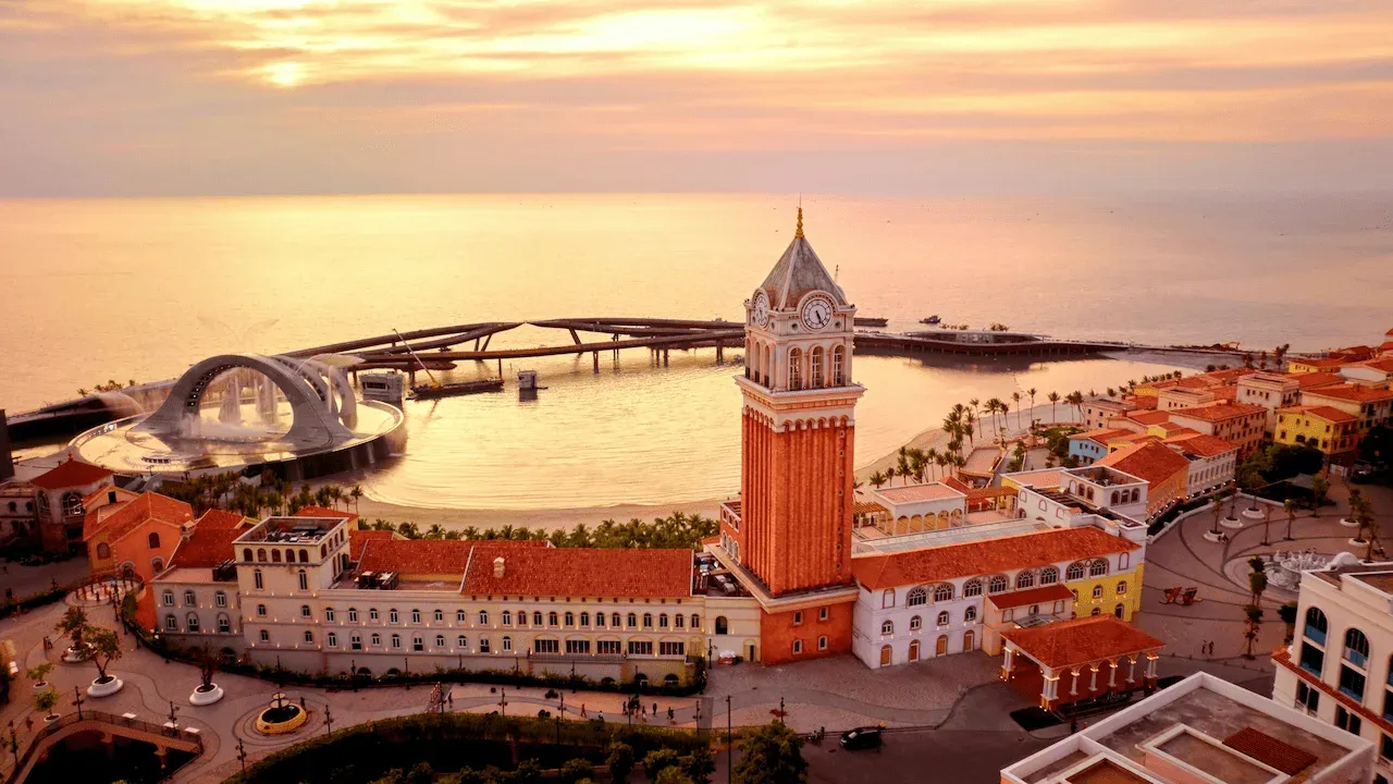 An aerial view of a city with a clock tower.