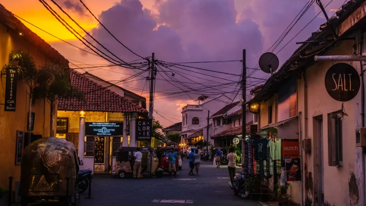 tourists wandering in tourist streets of galle