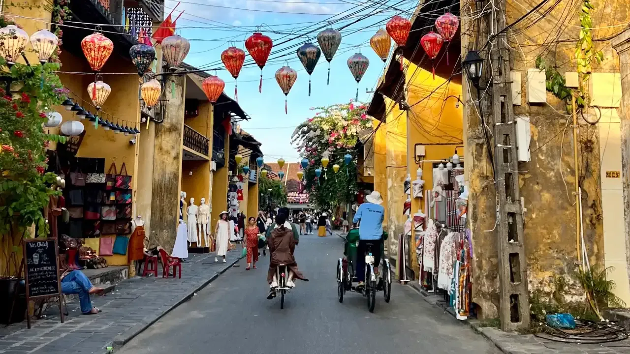 people cycling in hoi an
