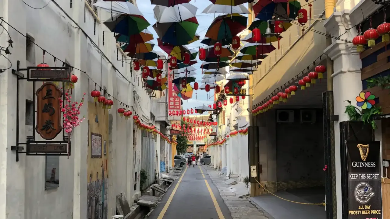 Market lane in Ipoh with overhanging umbrellas