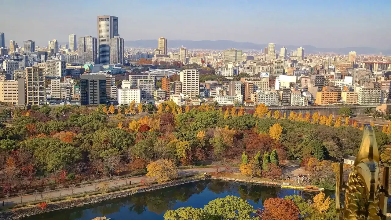 Osaka skyline in the fall with red and yellow trees